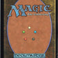 Outrageous Robbery R Murders at Karlov Manor 97 NM (Back)